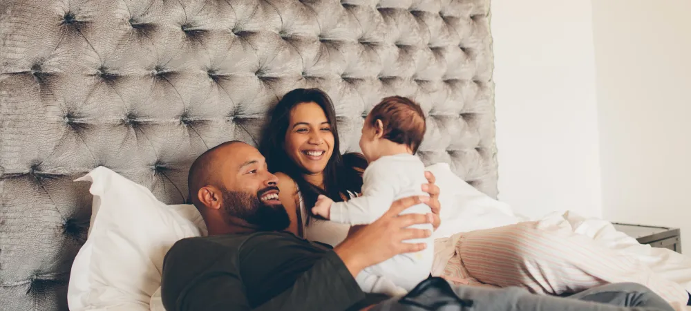 family in bed together 